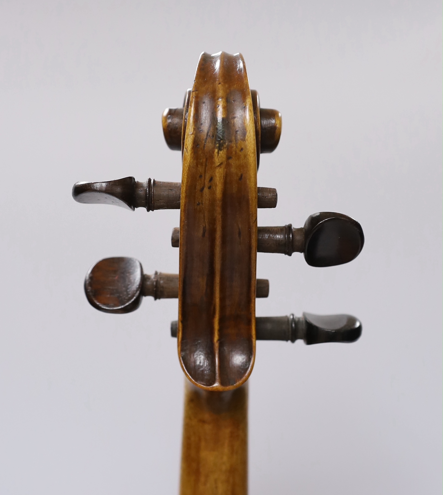 An early 20th century English violin stamped Norman Duke, London, one piece back with wax seal, cased, violin 60cm long